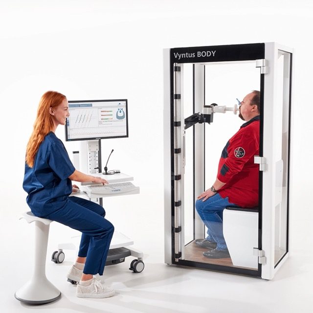 Pulmonary Function Test. Man taking a Vyntus BODY test